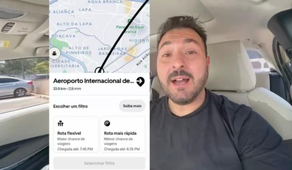 Homem em um carro falando para a câmera, com uma captura de tela de um aplicativo de navegação mostrando a rota até o Aeroporto Internacional de São Paulo.