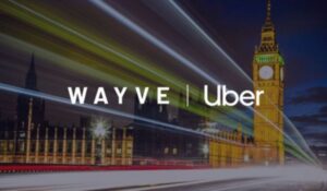 Logotipos da Wayve e Uber sobre uma imagem noturna de Londres, com o Big Ben iluminado ao fundo e rastros de luz simbolizando movimento.