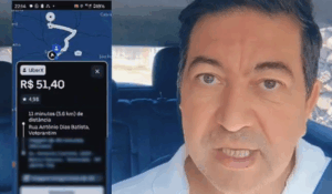 Homem dentro de um carro, falando diretamente para a câmera. Ao lado, aparece uma captura de tela do aplicativo Uber mostrando uma corrida de R$ 51,40 por um trajeto de 5,6 km em Votorantim.